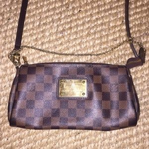 Louis Vuitton clutch or crossbody bag optional